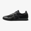 ASICS SportStyle TIGER RUNNER UNISEX - Sneaker Low - Black -Modekleidung 79cc02a8518045d6b6c1f0ad207f5d31